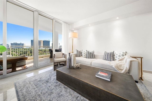 9751 E Bay Harbor Dr Unit 9C, Bay Harbor Islands, FL 33154 - living area with a wall of windows, a city view, recessed lighting, and marble finish flooring