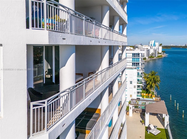 9751 E Bay Harbor Dr Unit 9C, Bay Harbor Islands, FL 33154 - view of building exterior with a water view