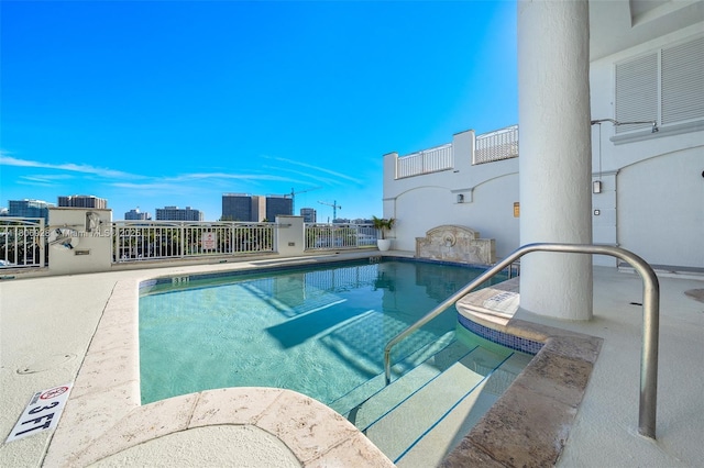 9751 E Bay Harbor Dr Unit 9C, Bay Harbor Islands, FL 33154 - community pool with a city view