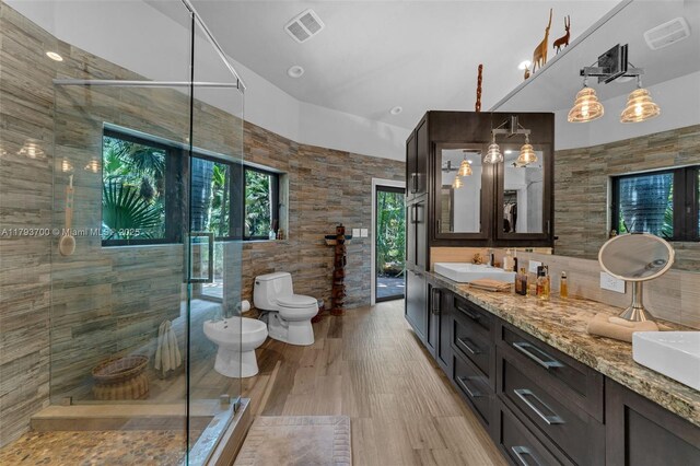 22800 SW 157th Ave, Miami, FL 33170 - full bath with a shower stall, a bidet, double vanity, toilet, and wood finished floors