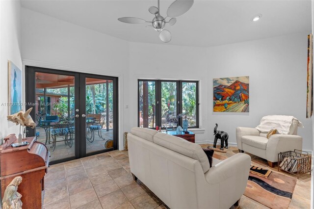 22800 SW 157th Ave, Miami, FL 33170 - living room featuring french doors, ceiling fan, plenty of natural light, recessed lighting, and light stone finish flooring