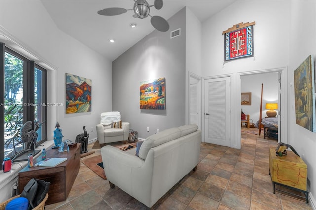 22800 SW 157th Ave, Miami, FL 33170 - living room featuring high vaulted ceiling, ceiling fan, stone finish floors, and baseboards
