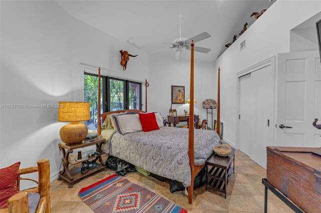 22800 SW 157th Ave, Miami, FL 33170 - bedroom featuring a closet, a high ceiling, a ceiling fan, and tile patterned floors