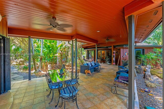 22800 SW 157th Ave, Miami, FL 33170 - view of patio with a ceiling fan, outdoor dining area, and an outdoor living space
