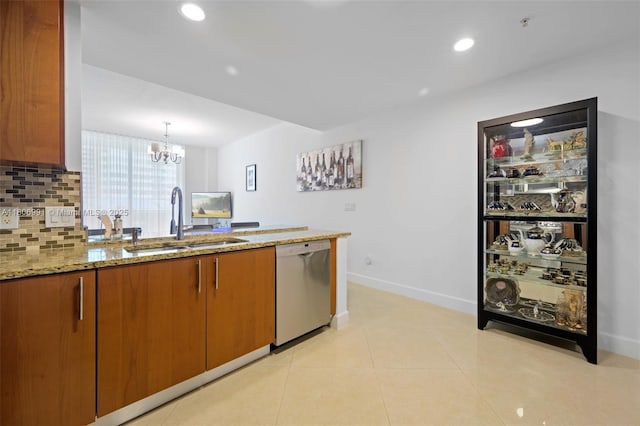 1945 S Ocean Dr Unit 404, Hallandale Beach, FL 33009 - kitchen with a sink, stainless steel dishwasher, a chandelier, tasteful backsplash, and light stone countertops