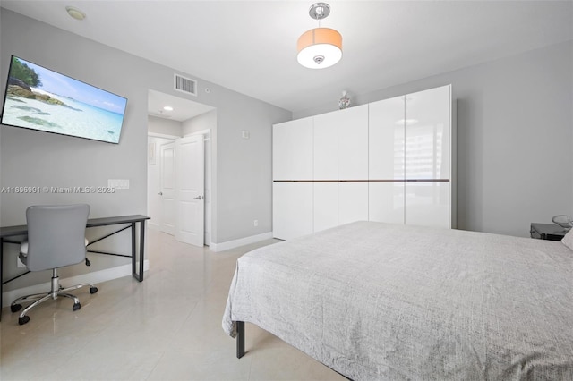1945 S Ocean Dr Unit 404, Hallandale Beach, FL 33009 - bedroom with light tile patterned flooring, baseboards, and an office area