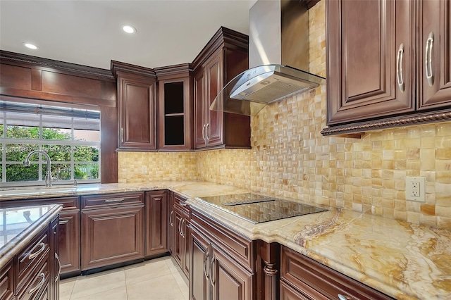 9620 E Calusa Club Dr, Miami, FL 33186 - kitchen with wall chimney exhaust hood, light stone counters, tasteful backsplash, light tile patterned floors, and recessed lighting