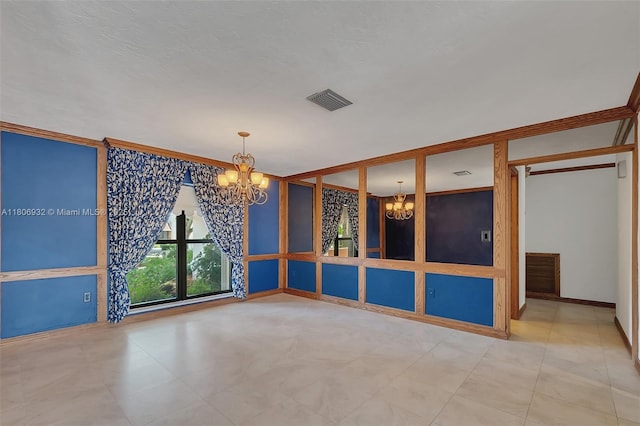 9620 E Calusa Club Dr, Miami, FL 33186 - spare room with a chandelier, ornamental molding, and baseboards