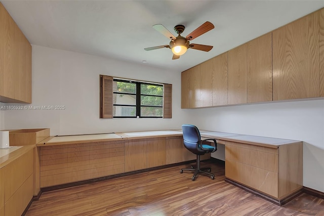 9620 E Calusa Club Dr, Miami, FL 33186 - unfurnished office with light wood-style flooring, ceiling fan, and built in study area