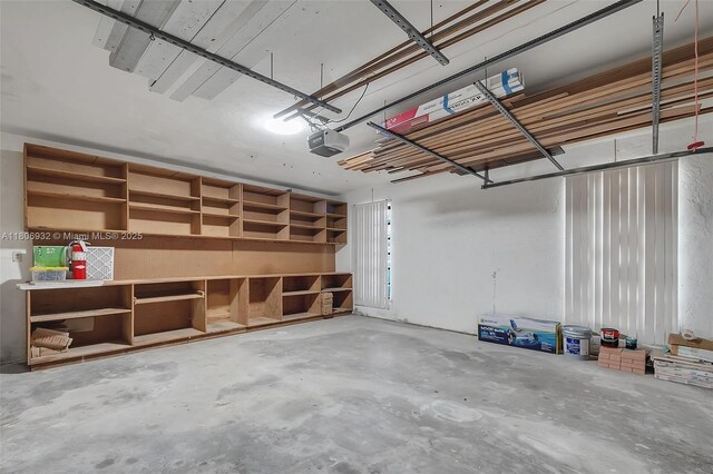 9620 E Calusa Club Dr, Miami, FL 33186 - garage featuring a garage door opener
