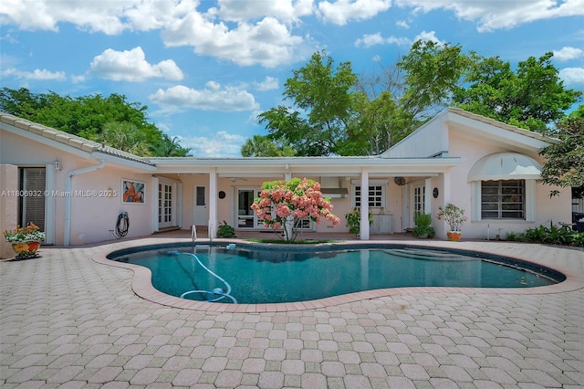 9620 E Calusa Club Dr, Miami, FL 33186 - swimming pool with a patio area