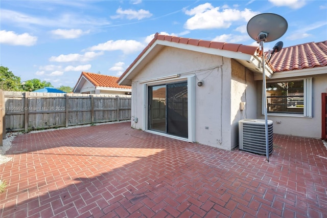 4609 SW 143rd Pl, Miami, FL 33175 - view of patio featuring central AC unit