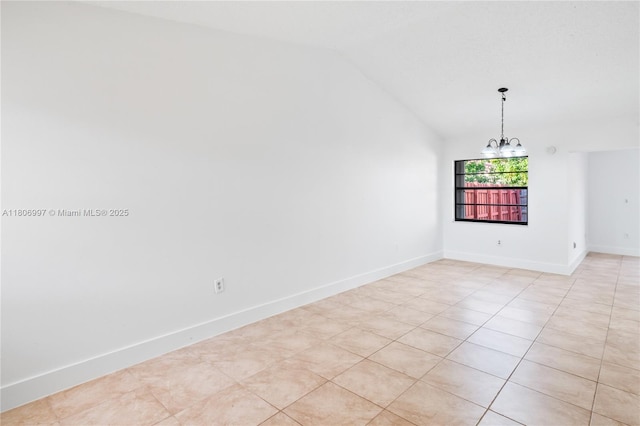 4609 SW 143rd Pl, Miami, FL 33175 - spare room featuring vaulted ceiling, a chandelier, and baseboards