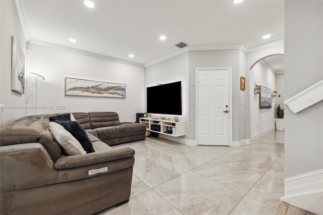 22607 SW 89th Pl, Cutler Bay, FL 33190 - living area featuring arched walkways, recessed lighting, ornamental molding, light marble finish flooring, and baseboards