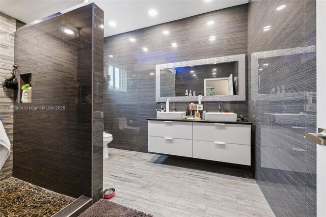 22607 SW 89th Pl, Cutler Bay, FL 33190 - full bath with tile walls, double vanity, and toilet
