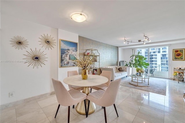 770 Claughton Island Dr Unit 1409, Miami, FL 33131 - dining room featuring track lighting and baseboards