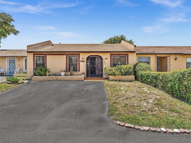 3034 NW 204th Ter, Miami Gardens, FL 33056 - ranch-style home featuring stucco siding