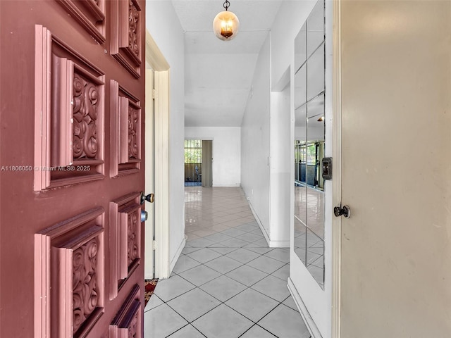 3034 NW 204th Ter, Miami Gardens, FL 33056 - entryway with light tile patterned floors and baseboards