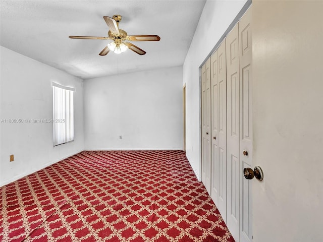 3034 NW 204th Ter, Miami Gardens, FL 33056 - unfurnished bedroom featuring carpet, a closet, and a ceiling fan