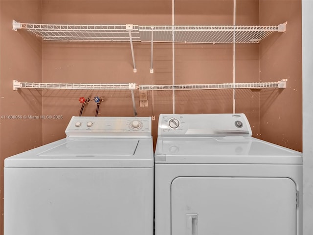 3034 NW 204th Ter, Miami Gardens, FL 33056 - laundry area with washing machine and clothes dryer