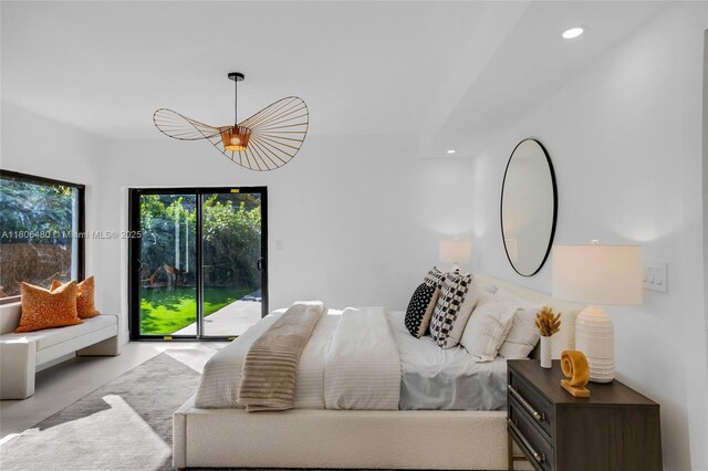 210 NE 107th St, Miami Shores, FL 33161 - bedroom with access to exterior and recessed lighting