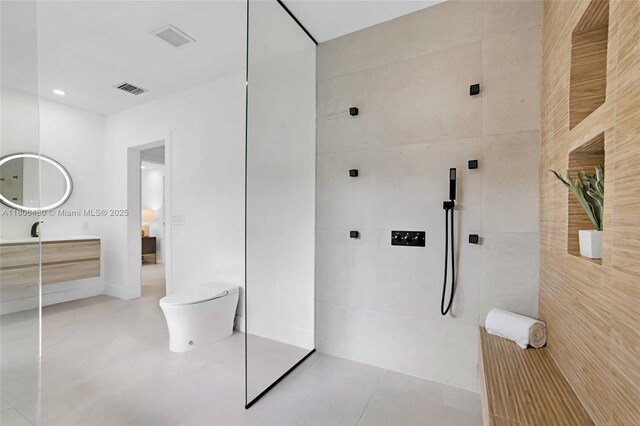 210 NE 107th St, Miami Shores, FL 33161 - bathroom featuring walk in shower, toilet, and vanity