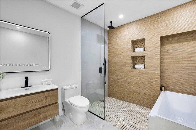 210 NE 107th St, Miami Shores, FL 33161 - full bath with a tile shower, toilet, vanity, tile patterned floors, and a tub to relax in