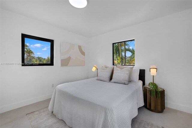 210 NE 107th St, Miami Shores, FL 33161 - bedroom with baseboards