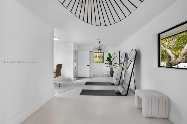 210 NE 107th St, Miami Shores, FL 33161 - hallway featuring baseboards