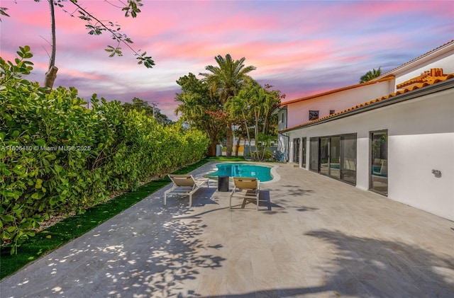 210 NE 107th St, Miami Shores, FL 33161 - view of swimming pool featuring a patio area