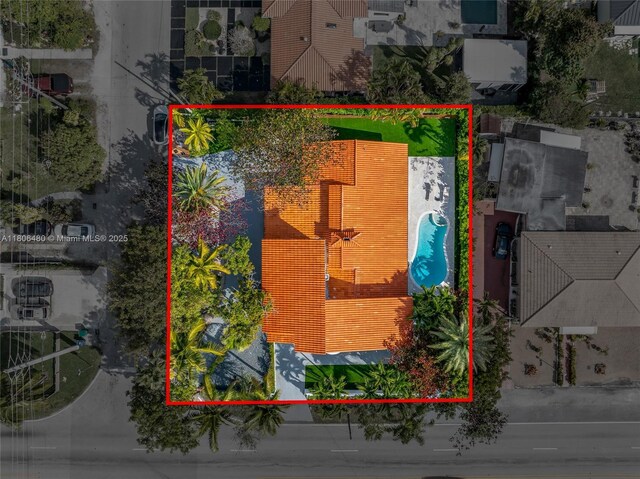 210 NE 107th St, Miami Shores, FL 33161 - aerial view of property's location featuring a pool and property parcel outlined