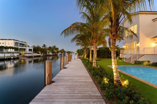 1051 San Pedro Ave, Coral Gables, FL 33156 - dock with a water view, a yard, and stairway