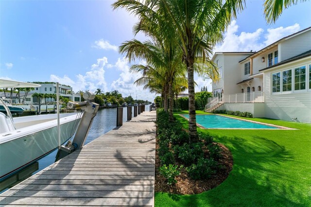 1051 San Pedro Ave, Coral Gables, FL 33156 - dock area with a yard and a water view