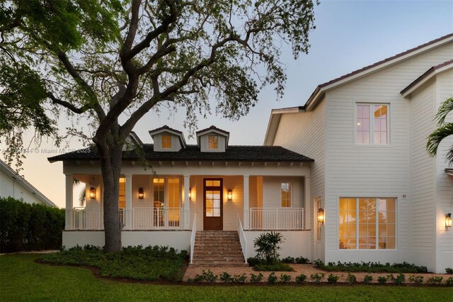 1051 San Pedro Ave, Coral Gables, FL 33156 - view of front of property featuring a porch and stairs