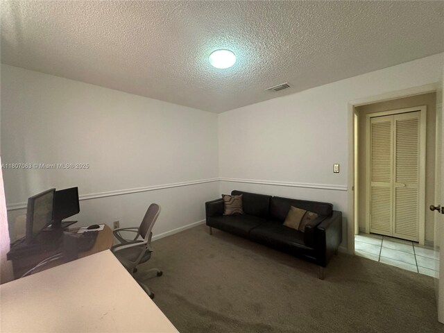 10075 NW 129th Ter, Hialeah Gardens, FL 33018 - carpeted home office featuring a textured ceiling