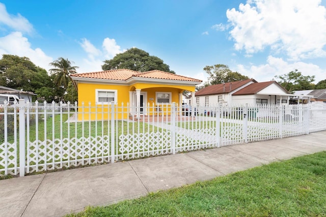 2757 NW 29th St, Miami, FL 33142 - view of front facade featuring a tile roof and stucco siding