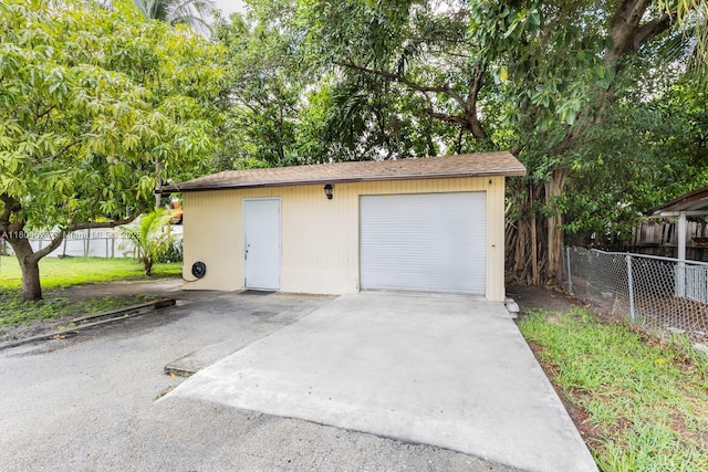 2757 NW 29th St, Miami, FL 33142 - detached garage featuring concrete driveway