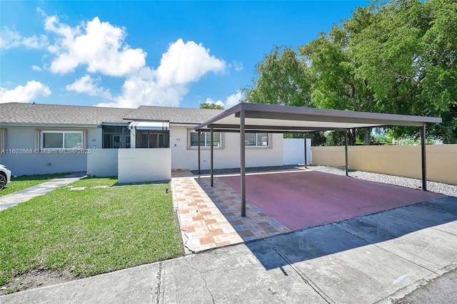 43 NW 109th Ct, Miami, FL 33172 - view of front of home featuring stucco siding and driveway