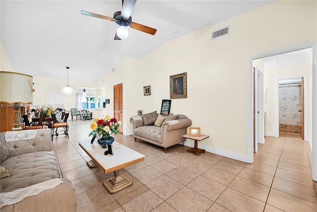 43 NW 109th Ct, Miami, FL 33172 - living area featuring light tile patterned flooring, a ceiling fan, baseboards, and high vaulted ceiling