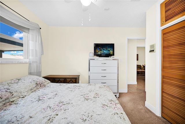 43 NW 109th Ct, Miami, FL 33172 - bedroom with a closet, carpet, a ceiling fan, and baseboards