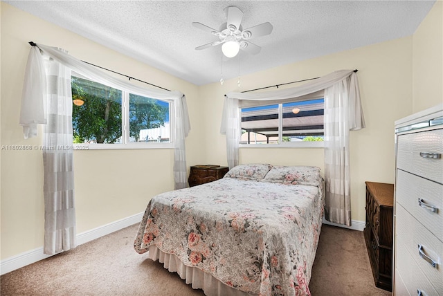 43 NW 109th Ct, Miami, FL 33172 - bedroom featuring carpet, baseboards, a textured ceiling, and ceiling fan