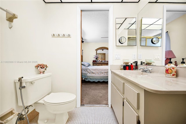 43 NW 109th Ct, Miami, FL 33172 - bathroom featuring connected bathroom, tile patterned flooring, vanity, and toilet