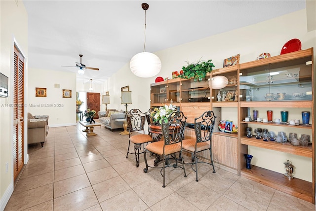 43 NW 109th Ct, Miami, FL 33172 - dining room with ceiling fan, tile patterned floors, and baseboards