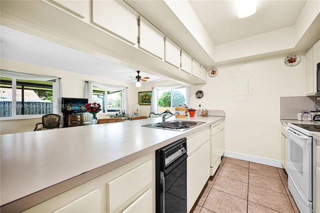 43 NW 109th Ct, Miami, FL 33172 - kitchen featuring a sink, white appliances, light countertops, white cabinetry, and baseboards