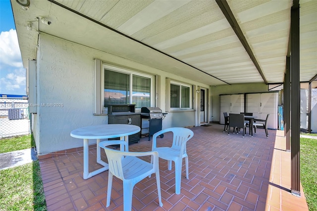 43 NW 109th Ct, Miami, FL 33172 - view of patio with outdoor dining area and a grill