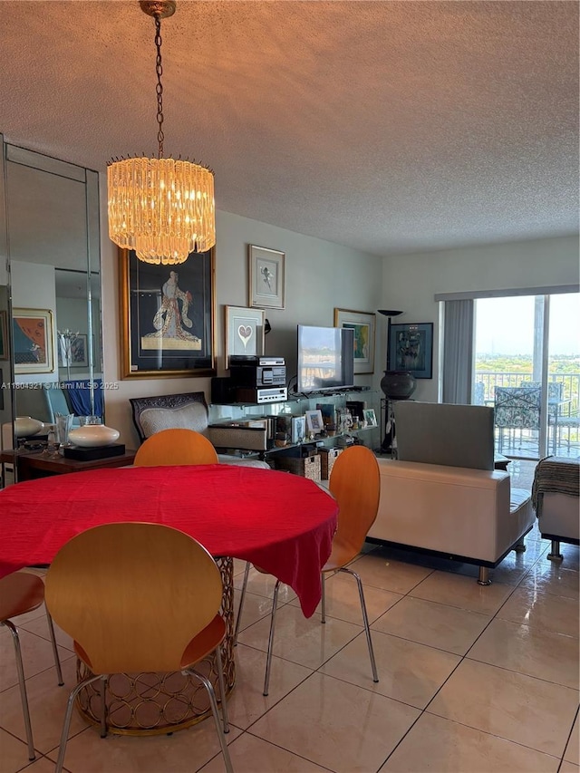 3850 Washington St Unit 1011, Hollywood, FL 33021 - tiled dining space featuring a chandelier and a textured ceiling