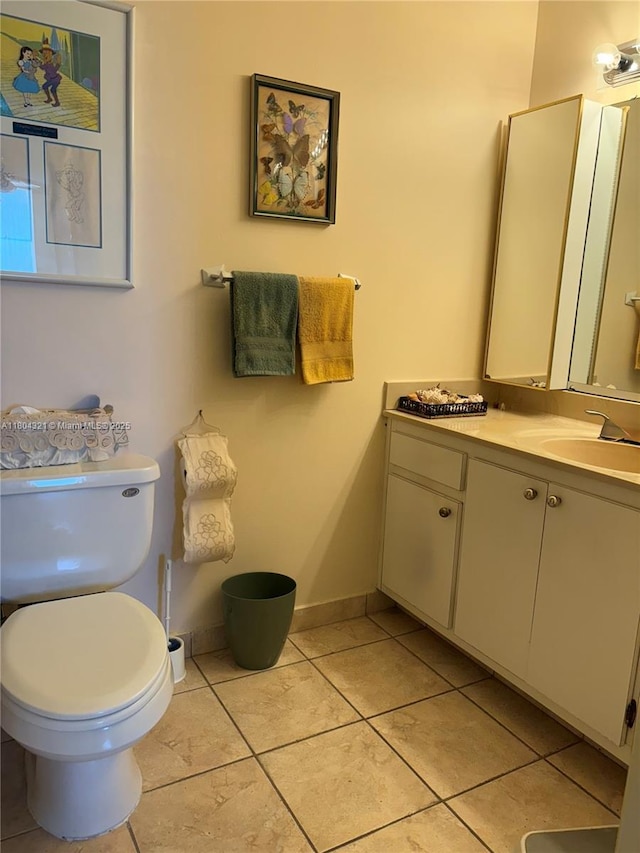 3850 Washington St Unit 1011, Hollywood, FL 33021 - half bath with vanity, tile patterned floors, toilet, and baseboards