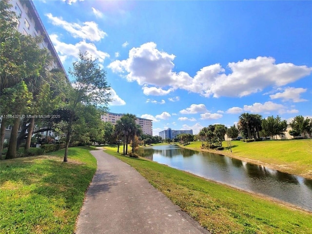 3850 Washington St Unit 1011, Hollywood, FL 33021 - surrounding community featuring a water view and a yard