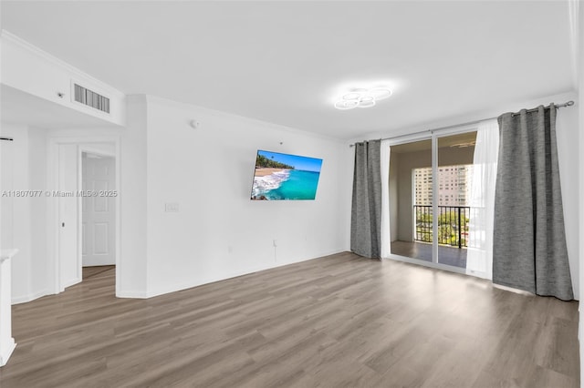 17150 N Bay Rd Unit 2814, Sunny Isles Beach, FL 33160 - empty room with wood finished floors and crown molding