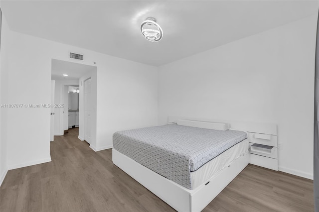 17150 N Bay Rd Unit 2814, Sunny Isles Beach, FL 33160 - bedroom featuring wood finished floors